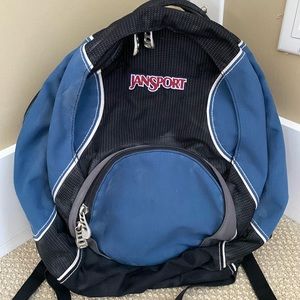 Janspory backpack with multiple compartments and cushion shoulder straps